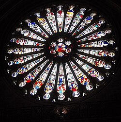 Angers Cathedral South Rose Window of Christ (center) with elders (bottom half) and zodiac (top half). Medieval stained glass by Andre Robin after the fire of 1451