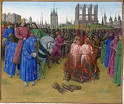 The burning of the pantheistic Amalrician heretics in 1210, in the presence of King Philip II Augustus. In the background is the Gibbet of Montfaucon and, anachronistically, the Grosse Tour of the Temple. Illumination from the Grandes Chroniques de France, c. AD 1455–1460.