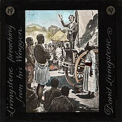 David Livingstone preaching from his wagon in Africa