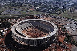 The Estádio Nacional in Brasília during its rebuild. The project was completed at a cost of US$900 million, against an original budget of US$300 million, making the stadium the second-most expensive football stadium in the world after England's Wembley Stadium.