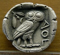 Silver tetradrachm coin at the Museum of Fine Arts of Lyon depicting the owl of Athena (c. 480–420 BC). The inscription "ΑΘΕ" is an abbreviation of ΑΘΗΝΑΙΩΝ, which may be translated as "of the Athenians". In daily use the Athenian drachmas were called glaukes (γλαῦκες, owls). This silver coin was first issued in 479 BC in Athens after the Persians were defeated by the Greeks.[1]