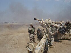 USMC M-198 firing outside of Fallujah, Iraq in 2004