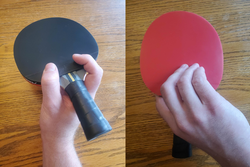The forehand (black) and backhand (red) view of a Modern Chinese Penhold grip. The back side is used for gameplay, and so the fingers are curled to allow space to hit the ball.