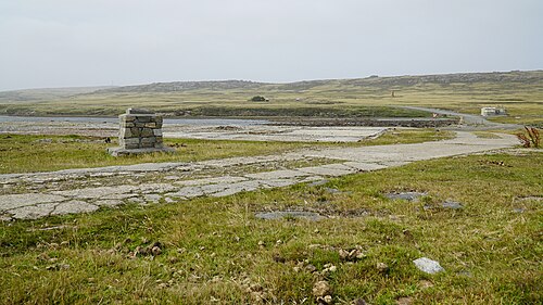 Site of Moody Brook Barracks, the island garrison for the Falklands. A small detachment of Royal Marines was stationed here from the 1960s until the invasion of 1982 when Argentine forces stormed the barracks. The site is that of the old wireless station. Only foundations remain today.