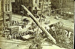 Raising the replica in Pioneer Square, 1940