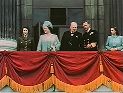 Elizabeth (far left) on the balcony of Buckingham Palace with her family and Winston Churchill, 8 May 1945
