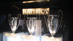 The three consecutive European Cup trophies won by Bayern Munich from 1974 to 1976. The one on the far right is the real trophy, given to Bayern permanently. The ones on the left are slightly smaller replicas.