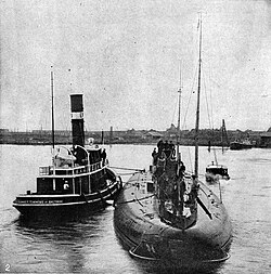 The German blockade-running submarine Deutschland arrives at Baltimore in July 1916.