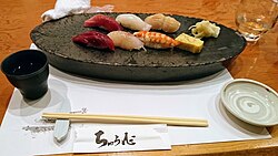 Stone plates are used at high-end Japanese restaurants in Ōarai, Ibaraki, Japan.