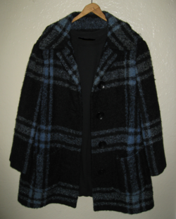 Jacket by Guy Laroche, from a woman's suit with a black skirt and blouse (1960)