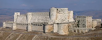 Krak des Chevaliers was built during the Crusades for the Knights Hospitallers.[212]