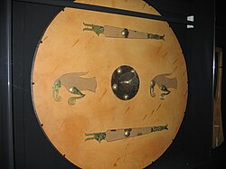 Vendel era shield found in Vendel, Sweden, decorated with two ravens assumed to represent Huginn and Muninn.