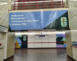 Multilingual sign inside Granville station, in English, French, Hunʼqumiʼnum, and Squamish