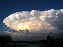 Strong wind shear in the high troposphere forms the anvil-shaped top of this mature cumulonimbus cloud, or thunderstorm.[13]