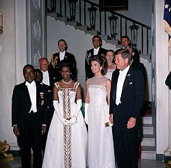 President Félix Houphouët-Boigny and First Lady Marie-Thérèse Houphouët-Boigny in the White House Entrance Hall with President John F. Kennedy and First Lady Jacqueline Kennedy in 1962