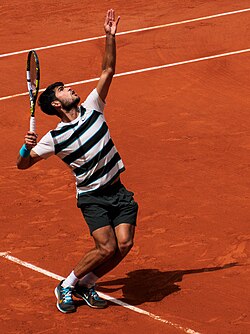 Alcaraz serving at the 2025 French Open