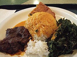 Nasi Padang with rendang, gulai, and vegetables, an example of Minangkabau cuisine