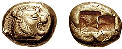 A coin from early 6th century BC Lydia bearing the head of a roaring lion with sun rays