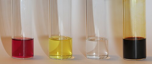 I2•PPh3 charge-transfer complexes in CH2Cl2. From left to right: (1) I2 dissolved in dichloromethane – no CT complex. (2) A few seconds after excess PPh3 was added – CT complex is forming. (3) One minute later after excess PPh3 was added, the CT complex [Ph3PI]+I− has been formed. (4) Immediately after excess I2 was added, which contains [Ph3PI]+[I3]−.[51]
