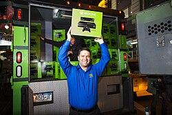 Best Buy employees unload Xbox One consoles from an armored truck during the official launch event in New York City, November 2013.