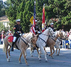 Horse-mounted color guard from Marine Corps Logistics Base Barstow