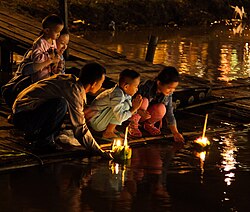 People floating krathong rafts during the Loi Krathong festival in Chiang Mai, Thailand