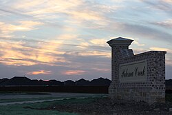 Sunset at Paloma Creek's entrance in Little Elm, Texas.