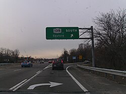 NY 135 sign on NY 25 eastbound