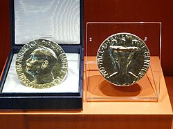 Obverse and reverse of Jimmy Carter's Nobel Peace Prize Medal