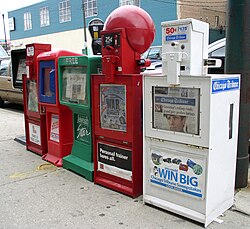 A Chicago Jewish Star news box (in green) in the South Loop, 2005.