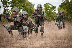 The soldiers of 5th Gurkha Rifles of the Indian Army take position during a training exercise.