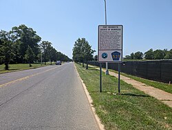 Sign describing the Avenue of Memories monuments