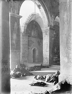 Wounded of the 5th Battalion Somerset Light Infantry and 4th Battalion Wiltshire Regiment in a Dressing Station located in the monastery at Kuryet el Enab which the 75th Division captured on 20 November 1917