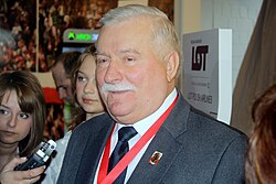 Wałęsa speaks at a tourism trade fair in Berlin, 2011.