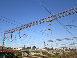 Gantry with old and new suspended equipment at Grivita railway station, Bucharest