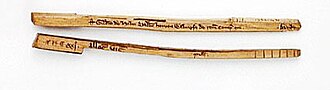 Tally sticks were issued by the Exchequer as a receipt for money paid in (the amount being recorded both in writing and in 'notches', cut into the wood). Pictured are the 'stocks' issued to the depositor; a parallel 'foil' would have been separated from the stock at the time of issue and kept by the Exchequer.