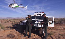 Border Patrol Agents with a Hummer and Astar patrol for illegal entry into U.S.