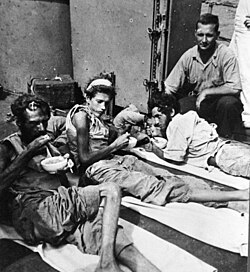 Rescued merchantmen on US Navy patrol boat after 83 days on raft, March 1943