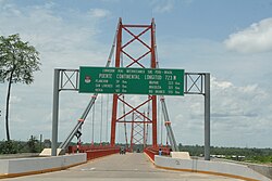 A bridge in Peru over the Madre de Dios River on the Interoceanic Highway, linking the Pacific Ocean to northwestern Brazil