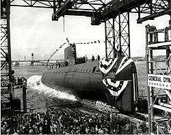 The launching ceremony of USS Nautilus January 1954. In 1958 it would become the first vessel to reach the North Pole.[11]