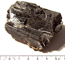 Wolframite mineral, with a scale in cm