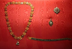 The insignia of a knight/lady companion of the Order of the Garter
