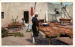 Drying peaches at Pueblo of Isleta, New Mexico c. 1900
