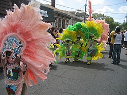 Mardi Gras Indians, second lines, and Carnival parades are part of Uptown's traditions.