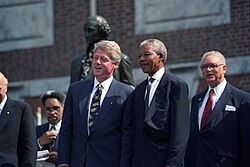 Mandela with US president Bill Clinton. Despite publicly criticising him on several occasions, Mandela liked Clinton, and personally supported him during his impeachment proceedings.[295]