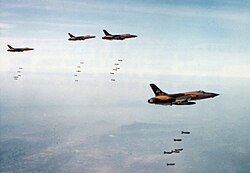 Republic F-105D fighter-bombers of the US Air Force drop 750 pound bombs during Operation Rolling Thunder