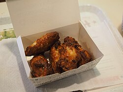A box of five chicken wings, served at a Hesburger fast food restaurant in Helsinki, Finland
