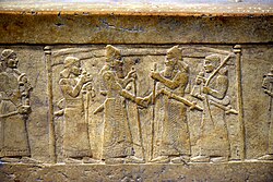 Depiction of Shalmaneser III (right) shaking hands with the Babylonian king Marduk-zakir-shumi I (left)