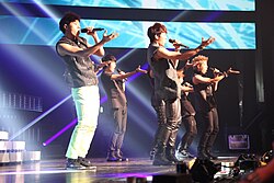 Infinite performing at Cyworld Dream Music Festival in 2011