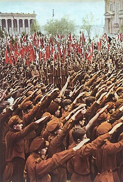 Hitler Youth members give the Nazi salute at a rally at the Lustgarten in Berlin, 1933.